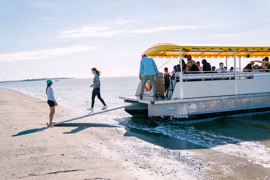 A classroom visits a barrier island with Coastal Expeditions Boeing Scholars, Coastal Expeditions Foundation, Heron, Fleet, Crab Bank