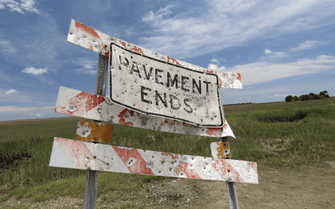 The sign at Copahee Sound where the pavement ends and nature begins